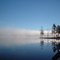 Grand Bayou Reservoir with a cloud