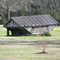 Aunt Molly"s Chicken House. The chicken house is constructed so that the chickens can roost inside on the angled slatted areas and the droppings will fall outside.