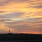 Drilling rig at sunset