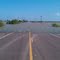 Levee overrun after Hurricane Alex