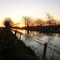 Atardecer en ruta rural inundada / Lautaro