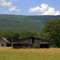Farm at the Foot of the Mountain