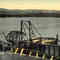 Fish wheel at mouth of Tanner Creek Oregon circa 1900, from a postcard.  Piling from these structures can still be seen along the shore at low water.