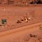 4-WD car driven over by iron ore truck as safety warning,rio tinto iron ore mine