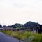 Aproaching Burnt out KIETA Whalf  area, in Kieta Harbour, on right is Kieta Penninsula, on Bougainville Island, in PNG, on 14-04-2004