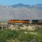 BNSF Train pulling along side US Route 40