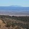 Atop Sullivan Butte looking northeast across the Chino Valley to the Mogollon Rim with San Francisco Peaks in the far background