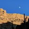 Moonrise over cliff walls