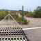 The cattle guard at Mullins Ln.
