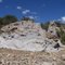 Milk Creek, monolith at road