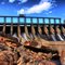 Here's a shot of the Mercier dam. HDR made with one single shot.  Tool used: Dynamic-Photo HDR / Photoshop (spot removal) Original picture and two other digital exposure (+1.5/-2)