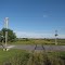 Ottawa Central Railway  (OCR), a division of CN.  Began in 1998 with 198 km. of tracks from Rideau Junction (Ottawa) to Pembroke.  Purchased by CN in 2008 with plans to upgrade.  The tracks by Beachburg have been torn up. They are worth $100,000 a km. as scrap.  Looking south east.