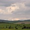 Undulating Foothills and East Slopes of the Canadian Rockies seen from Red Deer Lake  in Lloyd Park, Calgary SW, Alberta