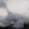 Moody Skies With Cloud Trails Streaming Off The High Mountain Peaks, Valemount BC Jul '11