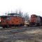CN train 586 in early spring at Vankleek Hill by the lonely caboose