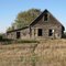 Wood frame homestead with staw/sod insulation