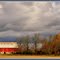 Red Barn With Approaching Storm
