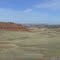 Stitched panorama view consisting of Red Wall, The Island and Roughlock Hill, from the side of Thirtythree Mile Rd. (Natrona Co. Rd. 110), Kaycee, Wyoming