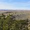 Looking north-westerly over the Lone Bear Creek draws towards Red Wall and the Bighorn Mountains, from north of Thirtythree Mile Rd. (Natrona Co. Rd. 110). Kaycee, Wyoming