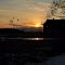 Barn and sunset on a cold winter day
