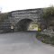 This beautiful  stone bridge built in 1891 for the Grand Trunk Railway (GT) when the line became double tracked.  The original line from Montreal reached Kingston in 1855.  The GT went bankrupt in 1912, and CNR took over.  It now carries some of the heaviest rail traffic in Canada even yet, from Windsor to Quebec.  On Little Creek Road.