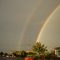 Street outside my house, with rainbows