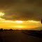 Gold Falling on a Dark Highway