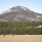 A Green Covered Peak And Flat Golden Plains - Varied Landscapes Near Invermere BC
