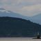 Walker Rock, Saltspring Island and the mountains of Vancouver Island in the distance