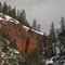 Contrasting, Painted Red Rock With Snowy White And Green Forest In Spectacular Sinclair Canyon Near Radium Hot Springs BC Mar '11