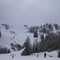 Skiers Descending To A Bottleneck - A Constriction Of Snow Traffic At Fernie BC