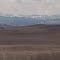 Rolling Prairie Hills Leading The Eye Up Towards The Mountains Near Okotoks AB West of Calgary Mar '13