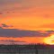 A Warm, Fiery Orange Sunset Near Stettler AB Southeast of Edmonton Apr '12