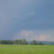 The Storms Building Off The Edge Of The Foothills And Green Prairie Near Sundre AB Northwest of Calgary June '08
