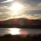 Sun rising over Sennebec Pond