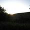 Sunset Behind a Hill