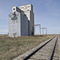 Grain Elevator and horizon at Primate, Saskatchewan looking west along the main line.