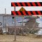 rising Manitou Lake reclaiming Highway 365