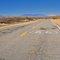 Route 66 shield painted on pavement near Goffs, CA