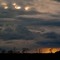 Sunset Under Storm Clouds
