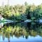 Panorama view of outside of cottage.