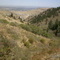 View looking north east down the canyon at North Table Mountain and the City of Golden Shops
