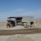 Mining trucks dumping ore