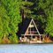 House and boat garage on Lake Tasso.