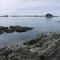 In the distance, Graves Rocks