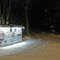 Near the lighted sign