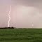 A Dramatic Lightning Bolt Thundering Over The Prairie North of Edmonton Aug '12