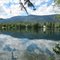 Mountain Ridges Symmetrically And Serenely Reflected On Eleanor Lake In Blue River BC Jul '10