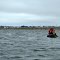 Paddling Hudson Bay into the Puvirnituq village; photo by Chris Rush