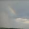 A Bit of a Rainbow With a Storm in the Background, Near Innisfail, AB, North of Calgary